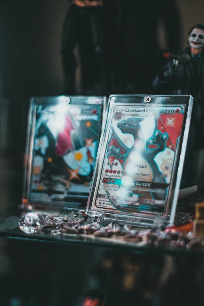 Crafting Captivating Headlines: Your awesome post title goes here Close-up of collectible Pokemon trading cards in protective cases on display.